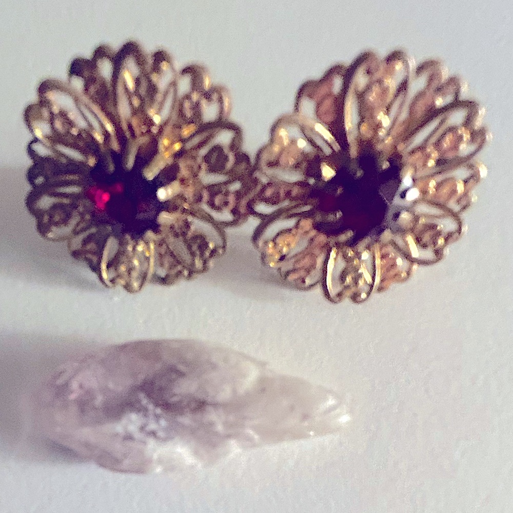 Vintage earrings Red faceted rhinestones gold filigree petals, screwback